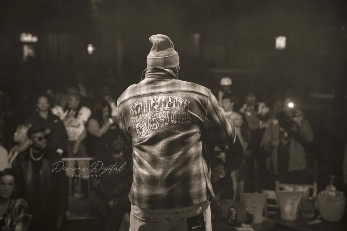 JayDubb Tha Ruler faces the crowd from the stage